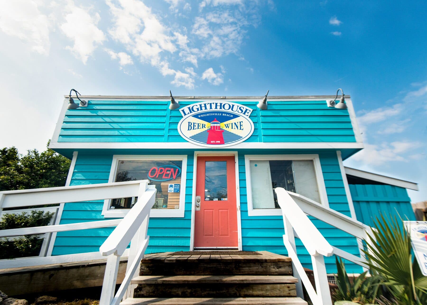 The teal Lighthouse Beer & Wine shop on Causeway Drive, Wrightsville Beach